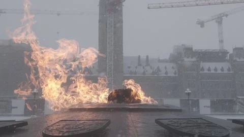 Close up of Centennial Flame During Blizzard Stock Footage 325784015