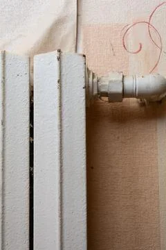 Close up of a central heating battery with rust Stock Photos