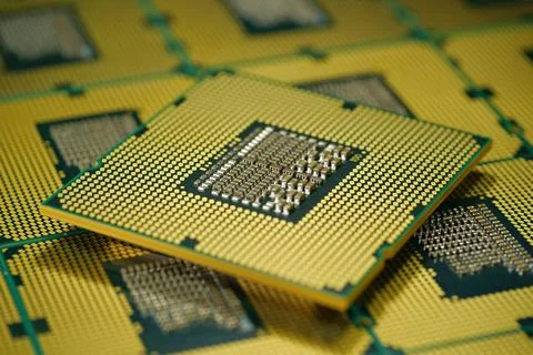 Close up of central processing unit revealing micro contacts and metal pins Stock Photos
