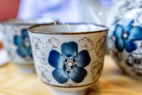 Close-up of ceramic Chinese Teacup with Cherry Blossom motifs Stock Photos
