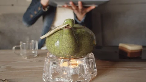 Close-up ceramic green tea brewer Stock Footage 119558190