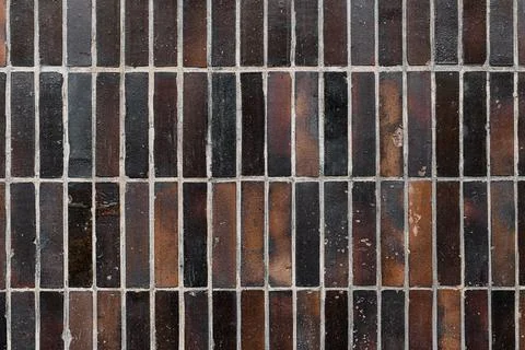 Close-up ceramic tile background. Brownish rectangular pattern tile. Stock Photos