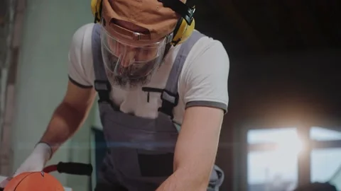 Close-up of ceramic worker using electric tile cutter in construction studio Video stock 170501416