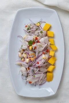 Close up of Ceviche, typical fish-based dish of Peruvian cuisine, presented.. Stock Photos