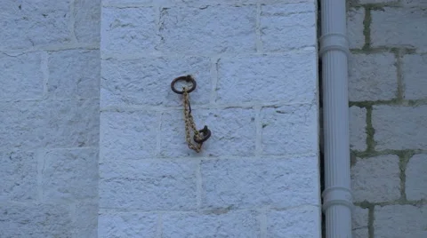 Close up of a chain on a wall in Nice Stock Footage 61066656