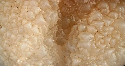 Close-up of chalcedony stone Morocco. Gem on a light background. Stockbeeldmateriaal 166885797