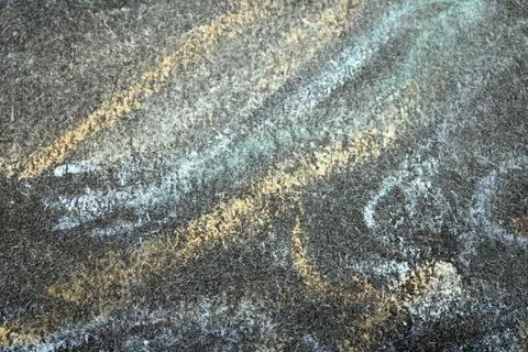 Close up of chalk pastel scribbles on a black paper background abstract Foto stock