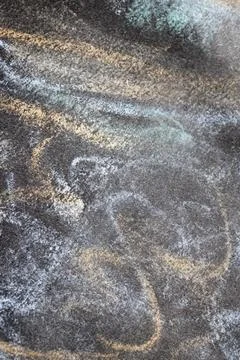 Close up of chalk pastel scribbles on a black paper background abstract Foto stock