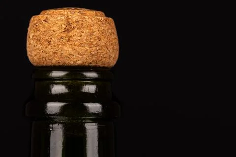 Close-up of champagne corks positioned on the right side against a black ba.. Stock Photos