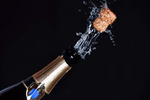 Close-up of champagne explosion Stock Photos