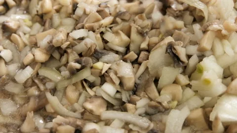 Close-up of champignon mushrooms Stock Footage 125810468