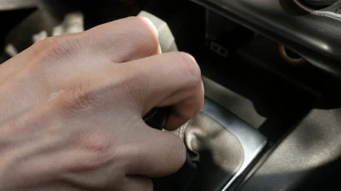 Close-up changing gears manually with car shift stick 4K footage Stock Footage 91416008