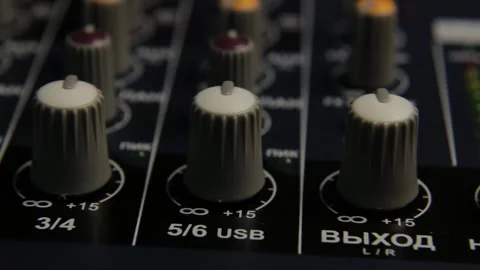 Close-up of channel controls on a professional audio mixer 스톡 동영상 306149552
