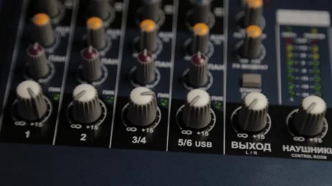Close-up of channel controls on a professional audio mixer Stock Footage 306149561