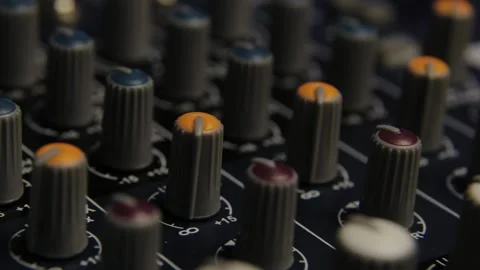 Close-up of channel controls on a professional audio mixer Stock Footage 306149581