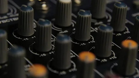 Close-up of channel controls on a professional audio mixer Stock Footage 306149584
