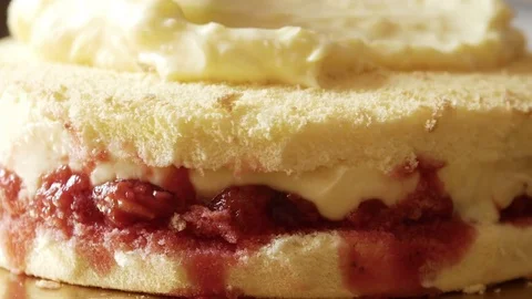 Close up of chantilly custard spread on the cake Stock Footage 73747032