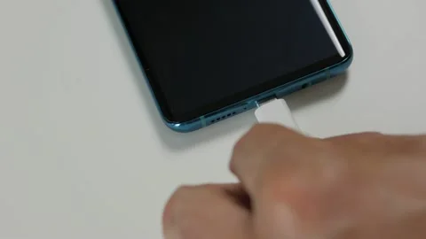Close-up of the charging connection to your phone. Phone charging port. Charging Video stock 156506746