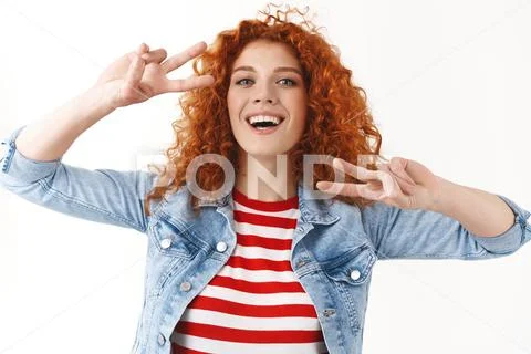 Close-up charismatic caucasian redhead curly girlfriend dancing having fun happy Stock Photos