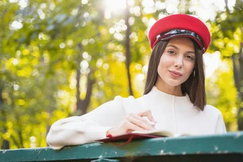 Close up of charming female that making notes Stock Photos