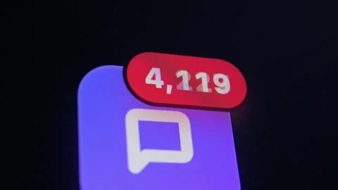 Close-up of chat app icon with red high-count notification badge. Stock Footage 336969338