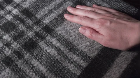 Close-up of checkered acrylic or wool fabric, women's sweater or scarf Stock Footage 135419946