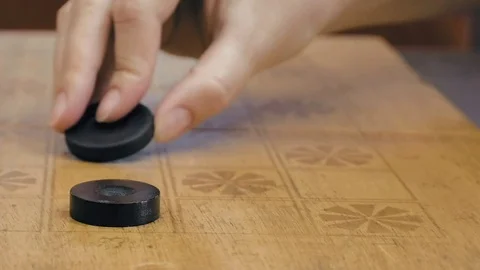Close up of checkers on checkerboard on the table Stock Footage 70005717