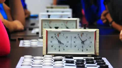 Close-up of checkers game tournament with clock. Time lapse Video stock 9446193