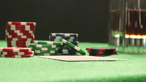 A close-up of checking poker pair of cards. Two red aces. Chips on a background. Stock Footage 139654164