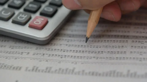 Close up checking stock index on newspaper. Stock Footage 39516051