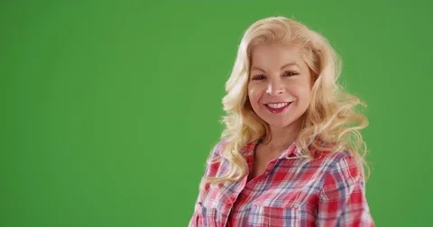 Close up of cheerful Caucasian woman smiling at camera on green screen Stock Footage