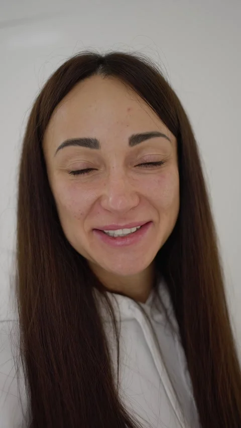 Close-up of cheerful woman's face. Concept of happiness and joy. Stock Footage 277230094