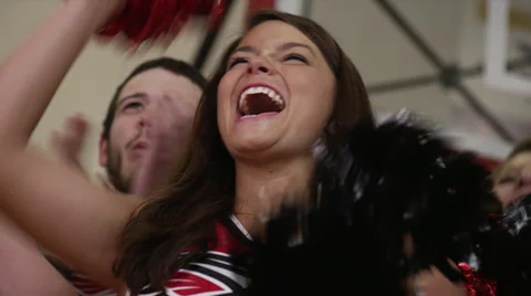 Close-Up of Cheerleaders Cheering Stock Footage 35240799
