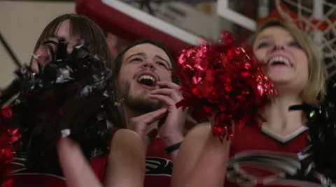 Close-Up of Cheerleaders Cheering Stock Footage 35242922