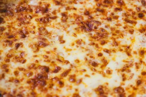 Close up of Cheese Pizza Texture. Stock Photos