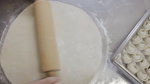 Close up of chef cook making dough for dumplings. Stock Footage 125050641