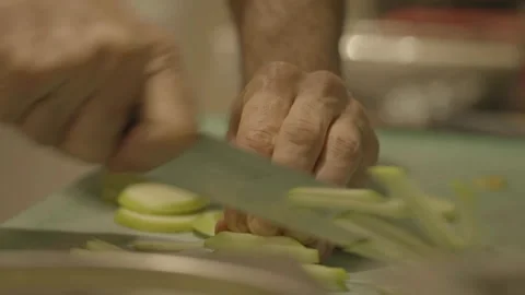 Close-up chef cutting apple into fries, focus on hands Stock Footage 336173882