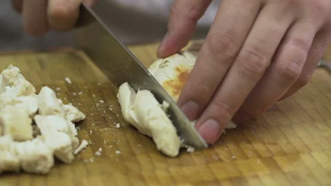 Close up of Chef is cutting boiled chicken Stock-Footage 103468791