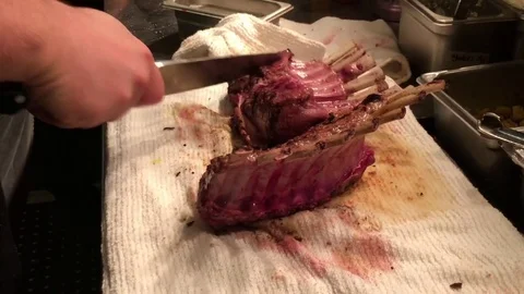 Close Up of Chef Cutting Grilled Lamb  Video stock 82316157