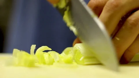 Close-up Of A Chef Cutting A Leek Stock Footage 127885257