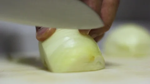 Close-up Of A Chef Cutting An Onion Stock Footage 127885242