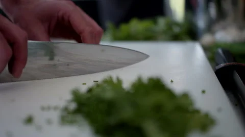 Close up of chef cutting vegetable at kitchen. Stock Footage 64116278