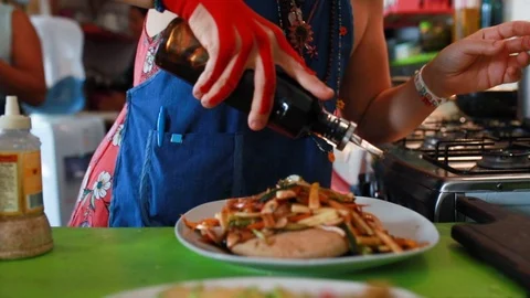 Close up of chef decorating plate with asian food,  Barichara, Colombia Stock Footage 135248164