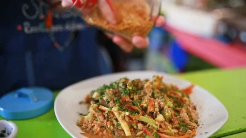 Close up of chef decorating plate with asian food,  Barichara, Colombia Stock Footage 135248600