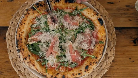 The close-up chef grating the cheese on the tasty pizza close up parmesan Stock Footage 94973895