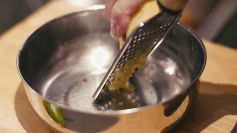 Close Up of Chef Grating Ginger Stock-Footage 130964856