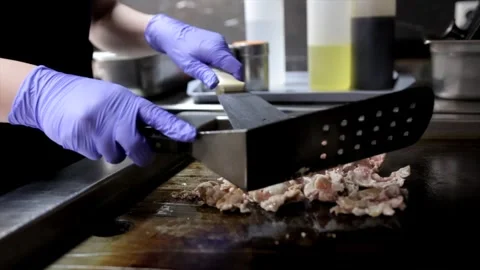 Close-Up of Chef Grilling Minced Meat on Stove in Restaurant Kitchen Stock Footage 288576148