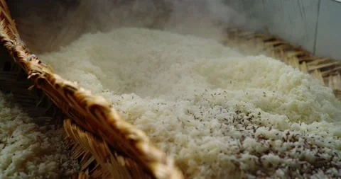 Close-Up of Chef Hand Stirring Rice for Uzbek Plov Stock Footage 346804692