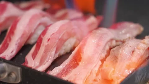 Close-up of Chef Hand Torch Searing Premium Wagyu Beef Sushi Nigiri in a Restaur Stock Footage 333570094