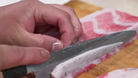 Close-up of Chef Handling Fresh Sliced Raw Wagyu Beef with Intricate Marbling on Stock Footage 333496198